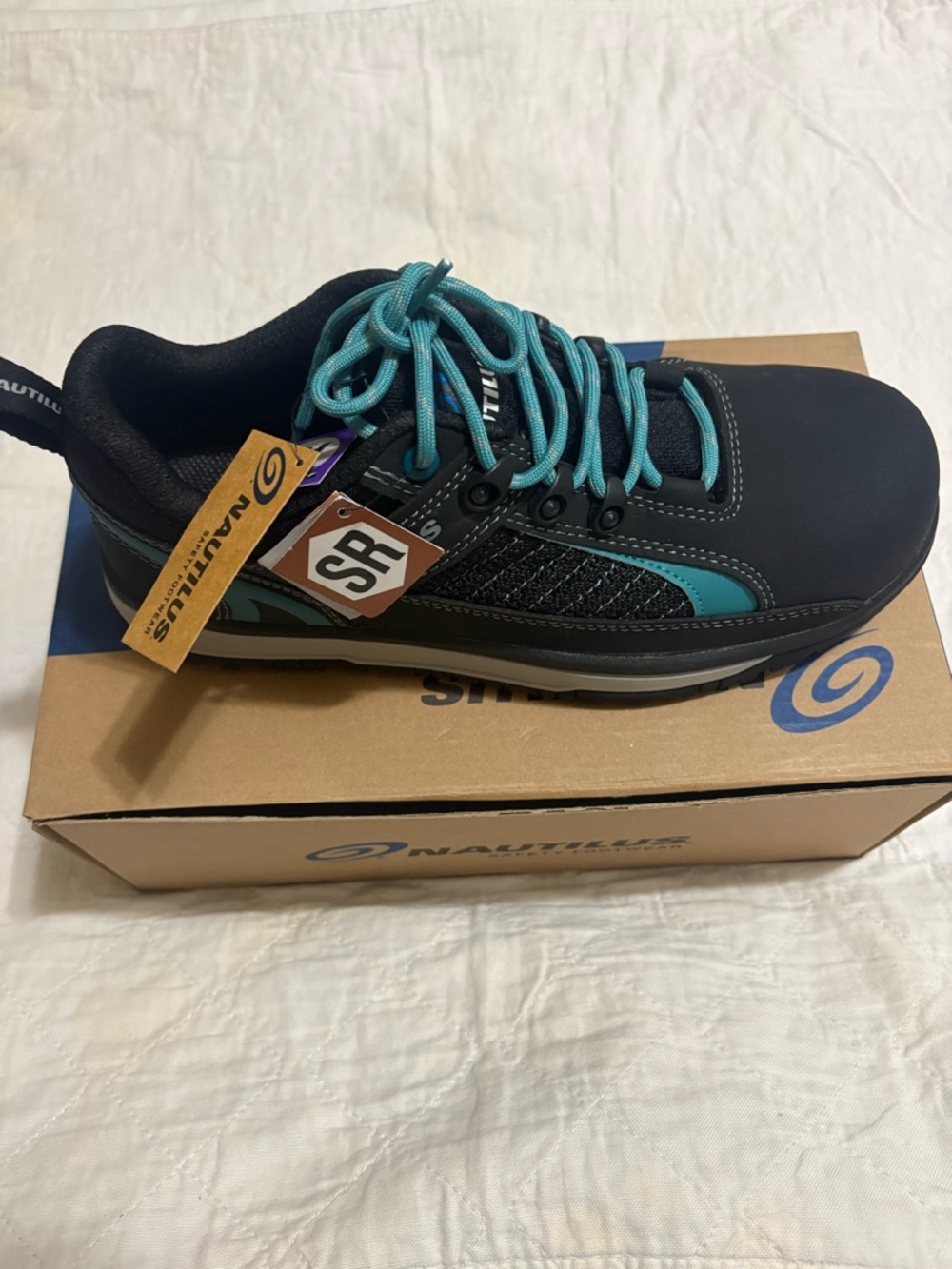 Nautilus Black Work Shoe with Teal Accents